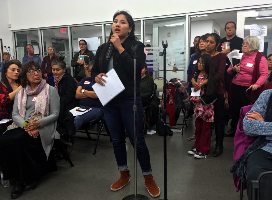 McKenzie Johnson, a junior at Cibola High School, speaks to APS district leaders and families at Paradise Hills Community Center.