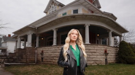 HGTV host Anna Camp stands in front of Bihl Manor in Fremont — the first haunted home to be featured on "A Very Haunted Renovation."