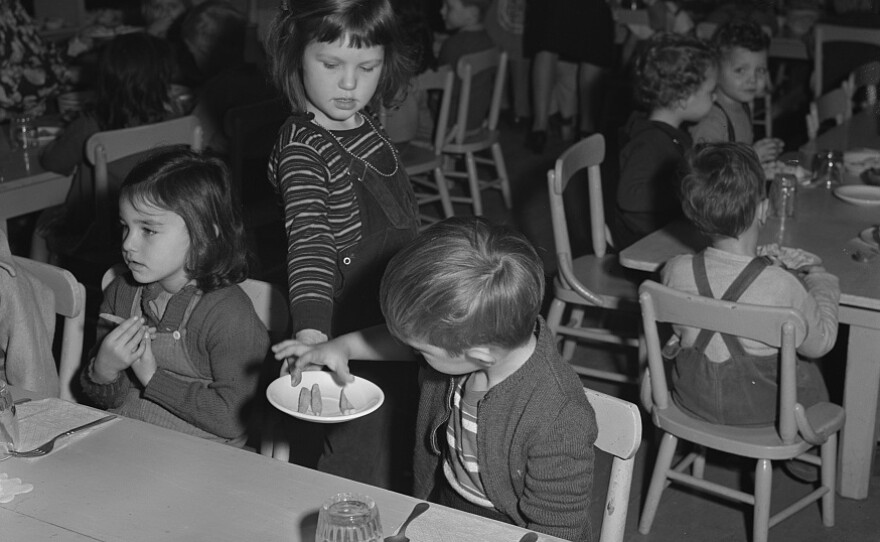 The scene in 1943 at a war workers' nursery in Oakland, Calif., where children were served cod liver oil and tomato juice in the morning, a nourishing lunch midday, and milk and crackers in the afternoon.