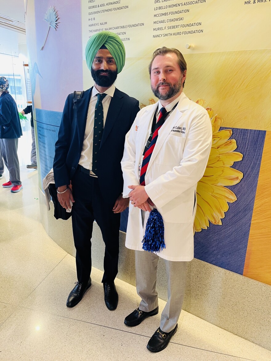 Tarunjeet Klair, MD, and Michael Cullen, MD, attend the congratulatory celebration for donors and recipients at University Health.