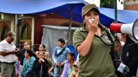 A photo of Nestora Salgado from her website. The caption says it is a photo of her as the leader of the community police.