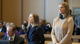 Michelle Troconis listens to arguments at the start of her trial, Thursday, Jan. 11, 2024, in Stamford, Conn. The trial of Troconis, charged in the 2019 killing of mother-of-five Jennifer Dulos, has begun in Stamford Superior Court with a six-person jury hearing the case.
