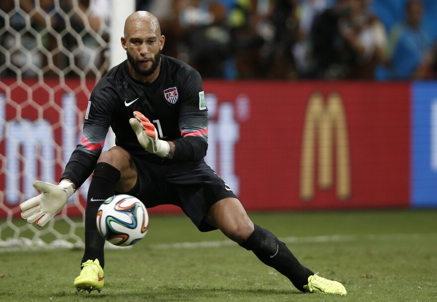 U.S. goalkeeper Tim Howard makes a save during extra time in the World Cup Round of 16 match with Belgium. Howard's record 15-save performance set off admiration and several Internet memes.