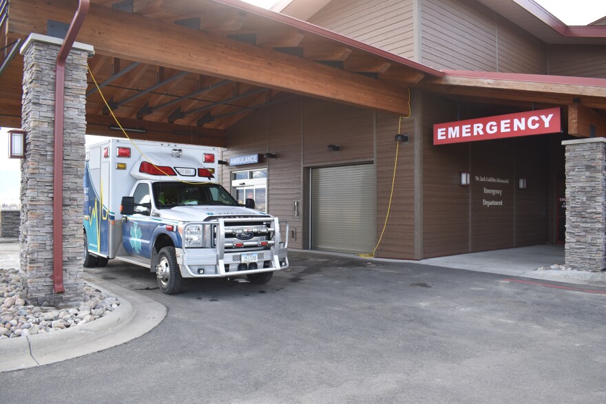An ambulance parked outside of the Madison Valley Medical Center in Ennis, Montana.