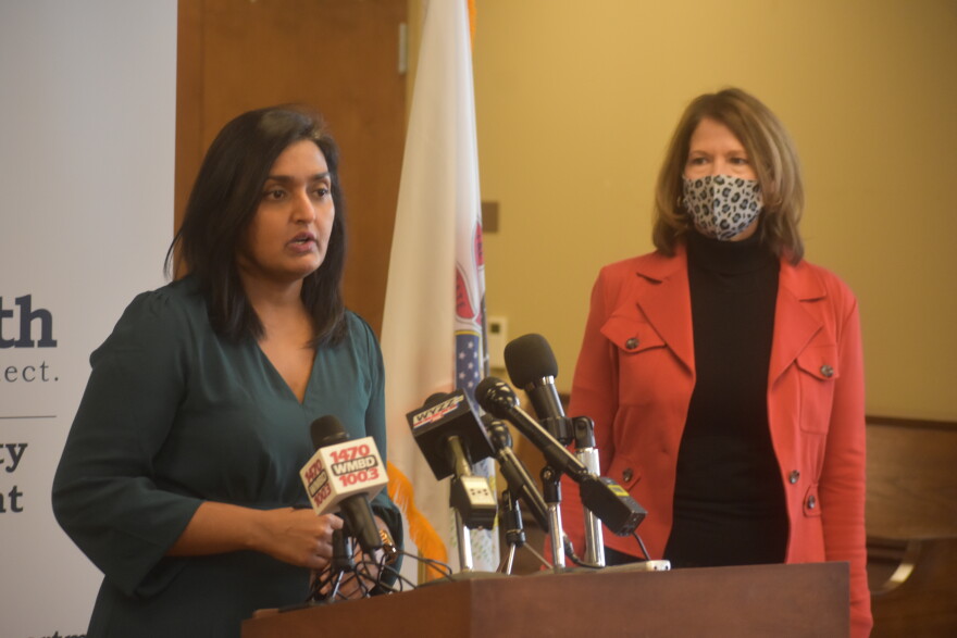 Peoria City/County Health Department Administrator Monica Hendrickson, left, and U.S. Rep. Cheri Bustos, D-Moline, held a press conference at the former Heddington Oaks nursing home in West Peoria, Feb. 10, 2021.