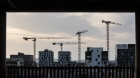 Buildings in front of cranes in the Euratlantique district of Bordeaux, southwestern France.