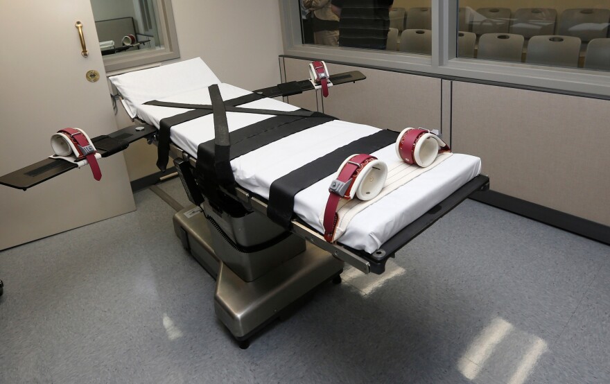 FILE - This Oct. 9, 2014, file photo shows the gurney in the execution chamber at the Oklahoma State Penitentiary in McAlester, Okla. (AP Photo/Sue Ogrocki, File)