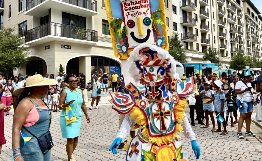 Ronnie Cash leads the way for the Junkanoo musicians during the daytime parade.