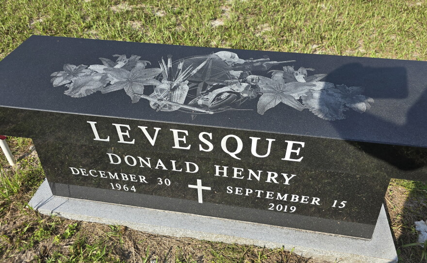 Memorials like that of Donald Levesque become part of DeLand history during Dr. Jenneffer Palupuka's Walk-With-A-Doc sessions.
