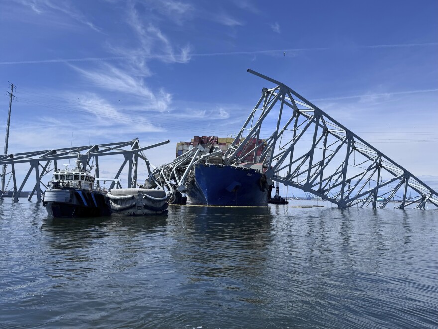 FILE - The fallen Francis Scott Key Bridge in Baltimore is pictured March 31, 2024, where divers assisted crews with the complicated and meticulous operation of removing steel and concrete. (AP Photos/Mike Pesoli, file)