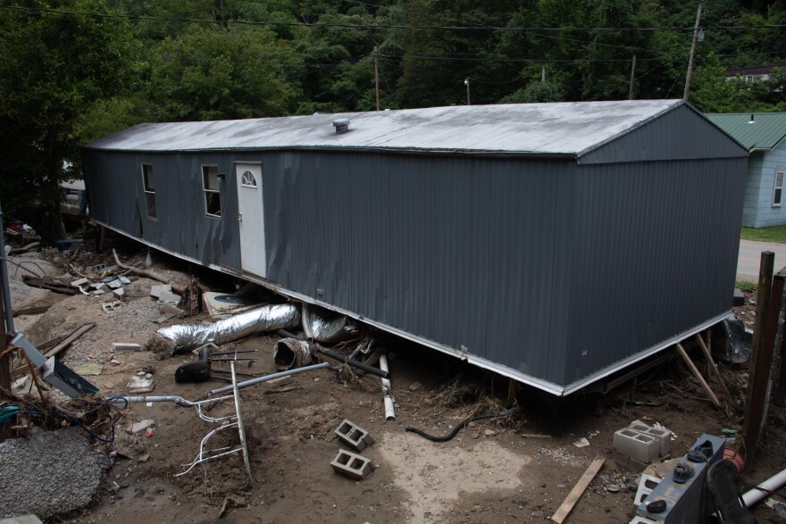 Jimmy Caudill's house in Bulan, Kentucky was lifted off a foundation of cinderblocks until settling on the side of the road.