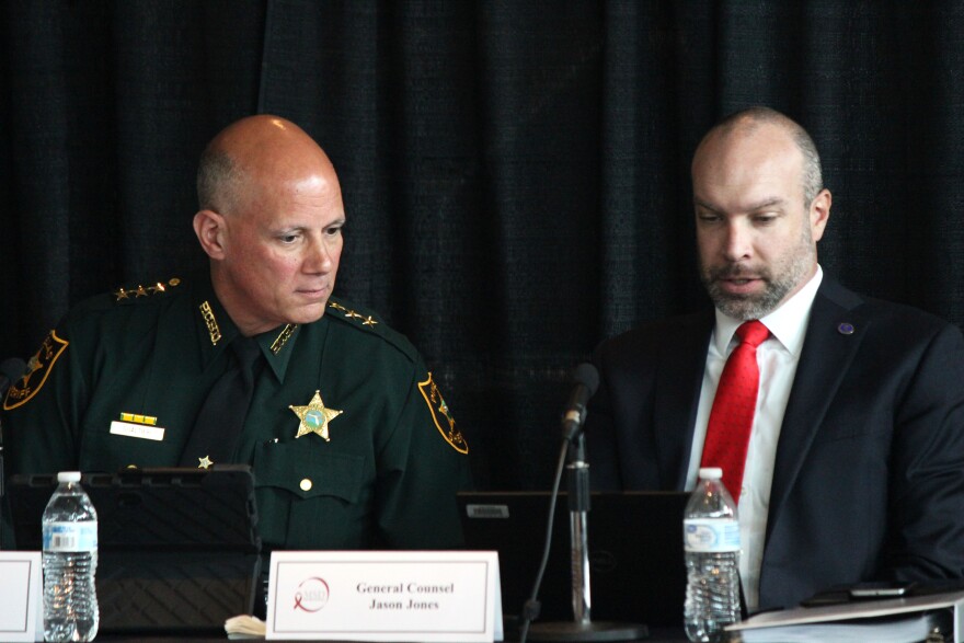 Pinellas Country Sheriff Bob Gualtieri speaks to Jason Jones, general counsel for the Florida Department of Law Enforcement, during a meeting of the Marjory Stoneman Douglas High School Public Safety Commission at the BB&T Center in Sunrise.