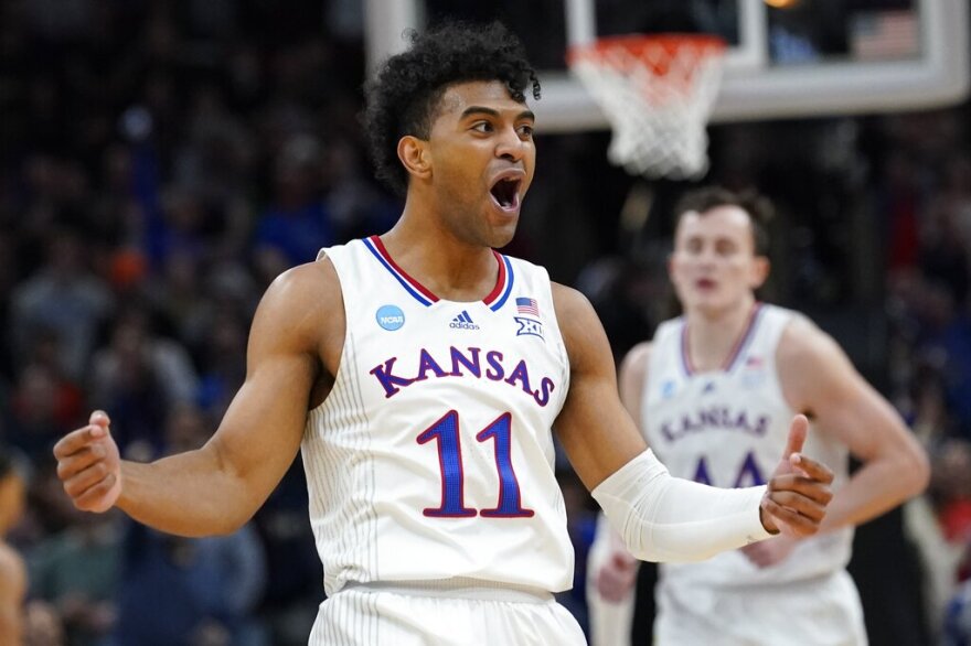 Kansas' Remy Martin reacts during the second half of a college basketball game in the Elite 8 round of the NCAA tournament Sunday, March 27, 2022, in Chicago.