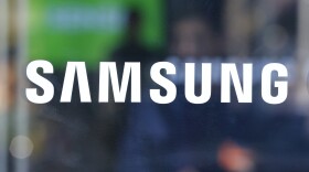 In this photo taken Oct. 29, 2015, the corporate logo of Samsung Electronics Co. is seen at its shop in Seoul, South Korea. Samsung has sued Chinese smartphone maker Huawei for allegedly violating six of its patents. The South Korean company said on Friday, July 22, 2016, that it chose to take legal action to defend its intellectual property despite trying to resolve the dispute amicably. (AP Photo/Lee Jin-man)