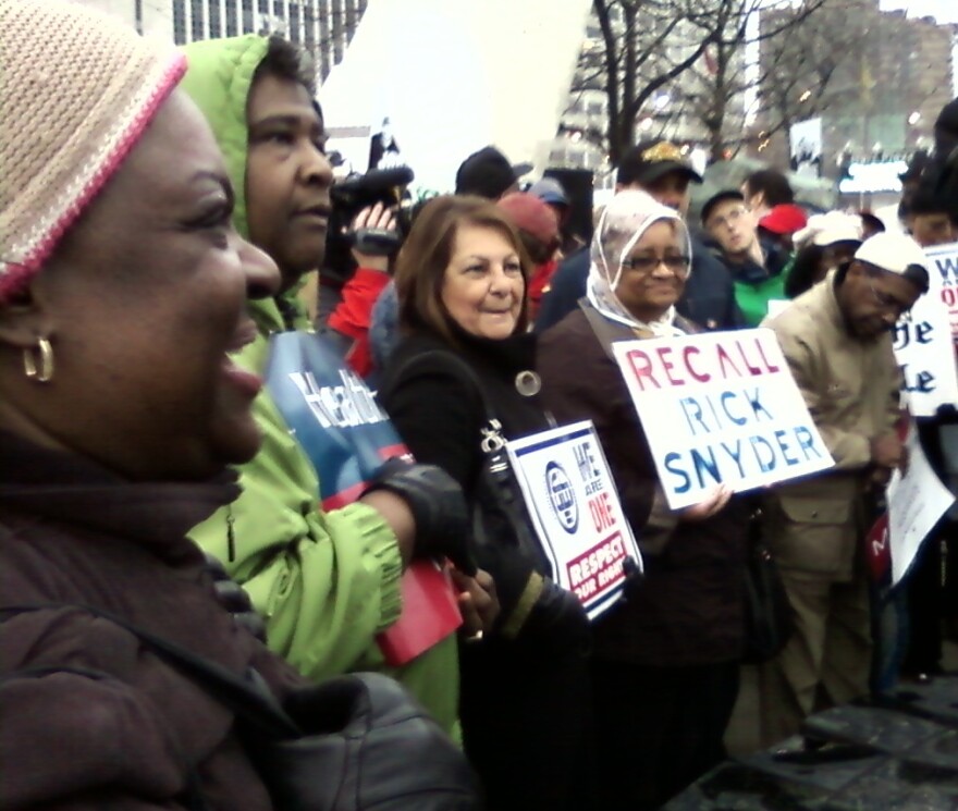 Labor supporters rally in Detroit's Hart Plaza