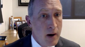 man in suit in an office
