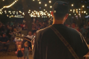 Musician plays for Moondance