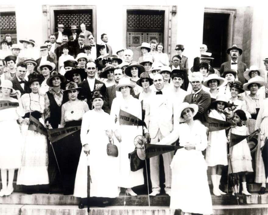 A women’s suffrage rally on the steps of the Arkansas state Capitol in 1917 celebrating passage of a bill to allow Arkansas women to vote in primary elections. Gov. Charles Brough can be seen standing in the front row, wearing a black tie and white jacket