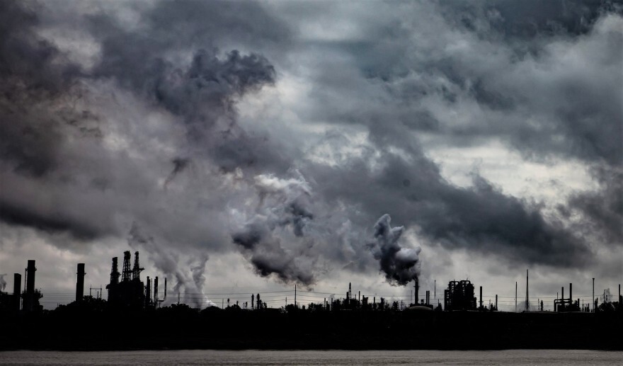  The bank of the Mississippi River north of Baton Rouge is dotted with petrochemical plants, oil refineries and paper mills.