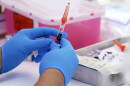 A flu vaccine is readied at the L.A. Care and Blue Shield of California Promise Health Plans' Community Resource Center. (AP Photo/Mark J. Terrill, File)