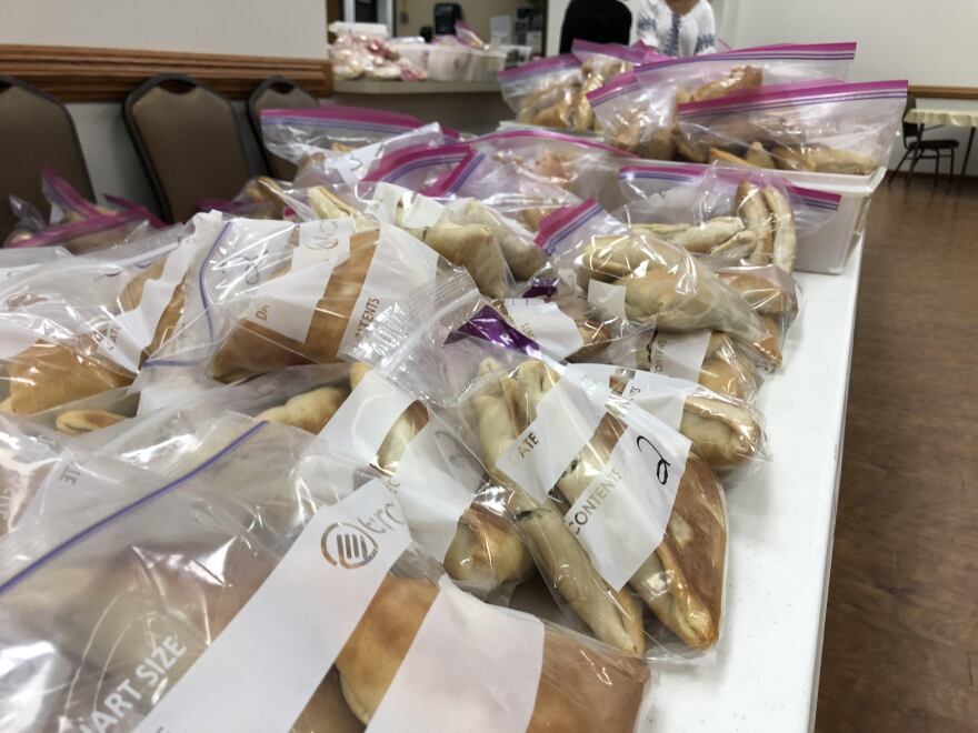 Meat and spinach pies being served at the annual church fundraiser at Our Lady of Lebanon, a Maronite church in Wheeling, W.Va.