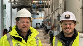 Traverse City utilities director Art Krueger (left) and Jacobs project manager Mark Huggard, inside of the Traverse City Regional Wastewater Treatment plant. (Photo: Ed Ronco/IPR News)