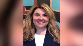 A white woman with long hair