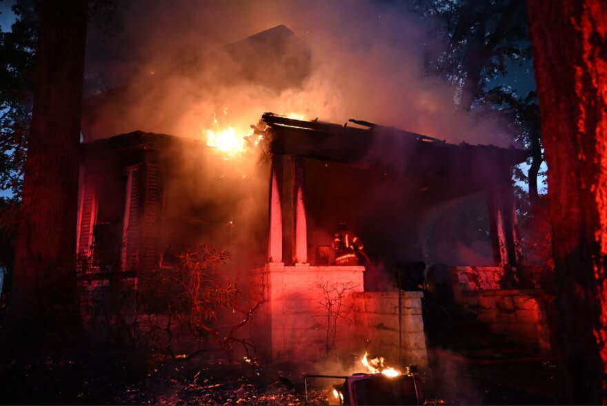 Evansville firefighters battle a house fire in the 1400 block of SE 2nd St., Sun., Sept. 27, 2026