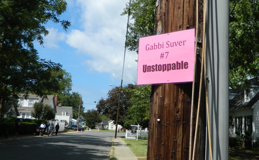 Posters Deborah White hung around Cambridge donning Gabrielle Suver's bib number.