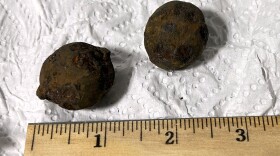 This photo provided by the Transportation Security Administration (TSA) shows two stolen Civil War-era cannonballs discovered by TSA officers in a checked bag at the Gulf Shores International Airport in Gulf Shores, Ala., on July 18, 2026. (Transportation Security Administration via AP)