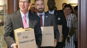 Kris Steele, left, Chair of Oklahomans for Criminal Justice Reform, and Ryan Kiesel, second from left, Executive Director, American Civil Liberties Union of Oklahoma, deliver petitions to the Oklahoma Secretary of State