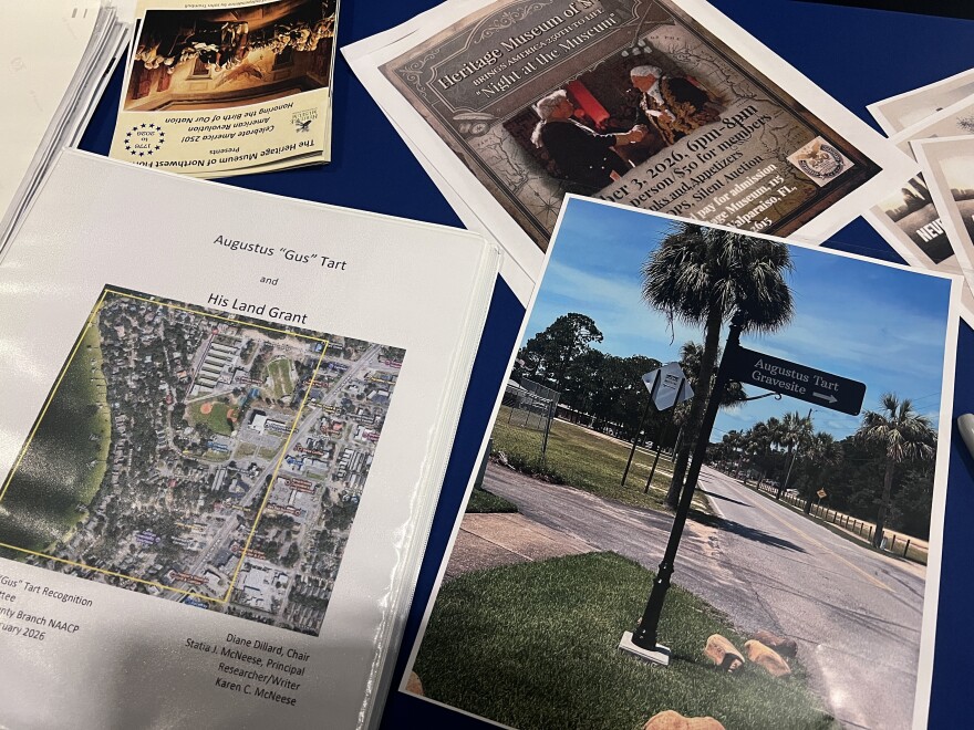 Documents on Gus Tart at Saturday's ceremony. 