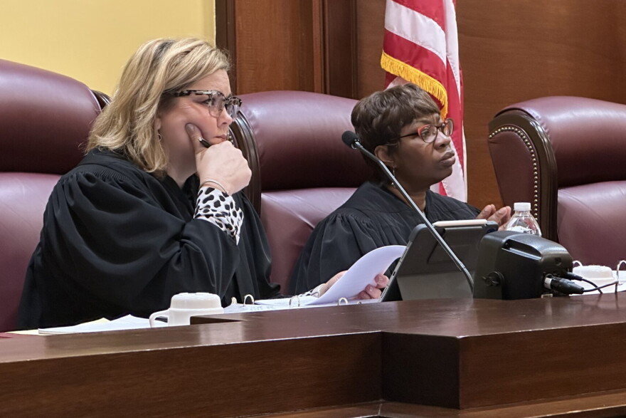 Missouri Supreme Court Judges Kelly Broniec, left, and Robin Ransom listen to arguments Thursday, Feb. 1, 2024, in in a case over state Senate redistricting in Jefferson City.