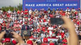 President Donald Trump spoke to a crowd of supporters attending a rally on Oct. 29, 2020 in Tampa. Most in attendance did not wear masks health officials recommend to prevent the spread of the coronavirus. Photo: Daylina Miller / WUSF Public Media