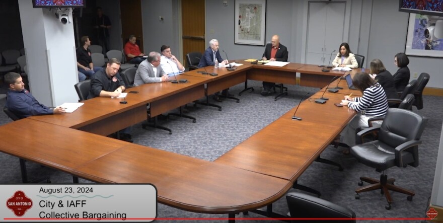 Negotiators for the San Antonio Professional Firefighters Association and the City of San Antonio on Friday night.