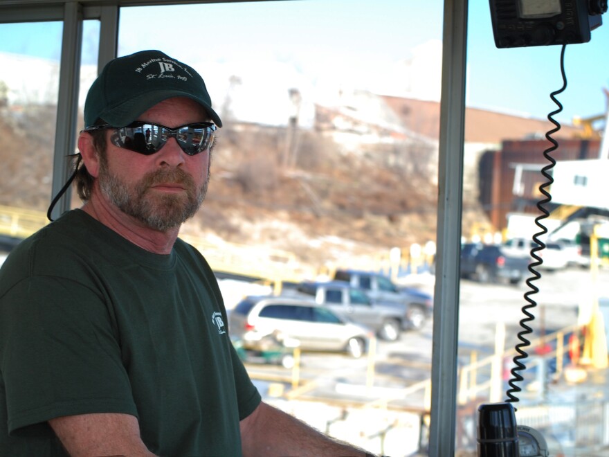 "We're at the mercy of Mother Nature," says Larry Rowe, captain of a JB Marine boat. People along the Mississippi are hoping for significant snowmelt to raise the water levels.