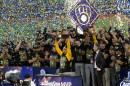 Milwaukee Brewers catcher William Contreras holds the MVP trophy after they won baseball's World Series against the Tampa Bay Rays, Wednesday, Oct. 28, 2026, in St. Petersburg, Fla.