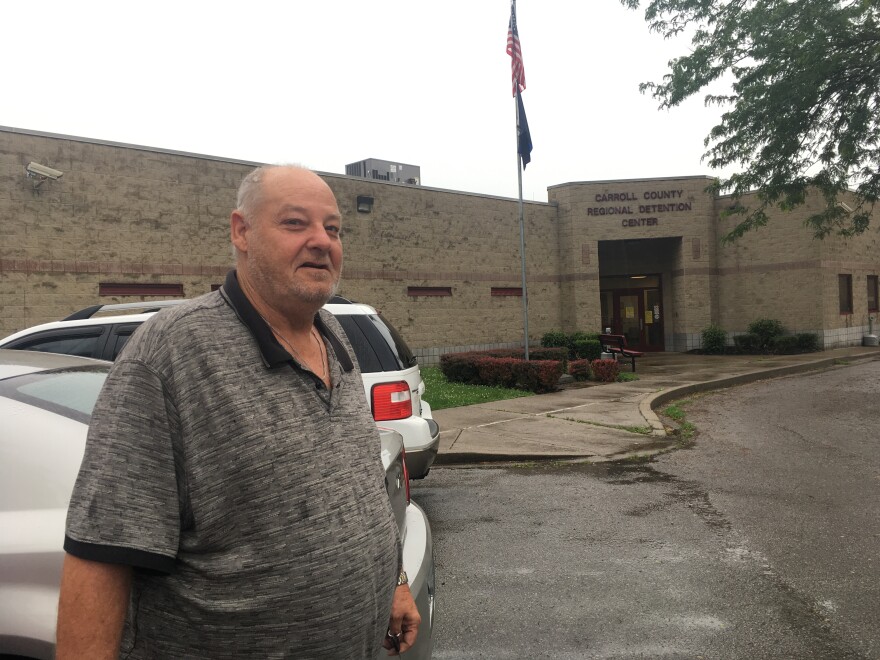 Ronald Chadwell speaks with reporters outside the Carroll County jail.