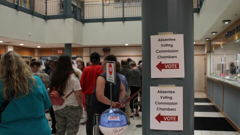 Voters line up at the Boone County Government Center to cast their votes before election day.