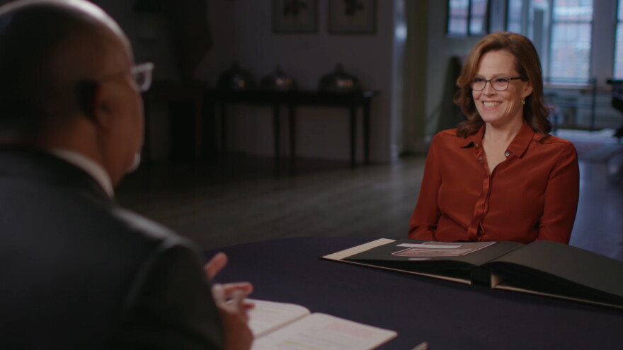Finding Your Roots, Season 6 Caption: Host Henry Louis Gates, Jr. and actress Sigourney Weaver while taping Finding Your Roots. Photo Credit: Courtesy of McGee Media/Ark Media. For editorial use only in conjunction with the direct publicity or promotion of this program for a period of three years from the program's original broadcast date, unless otherwise noted. No other rights are granted. All rights reserved.