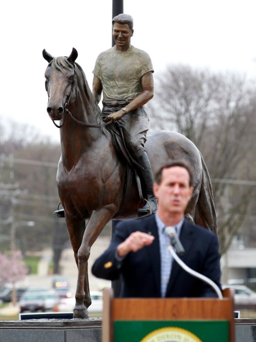 Rick Santorum speaks during a campaign stop in Dixon, Ill., on March 19. Is the party's obsession with Ronald Reagan overshadowing today's candidates?
