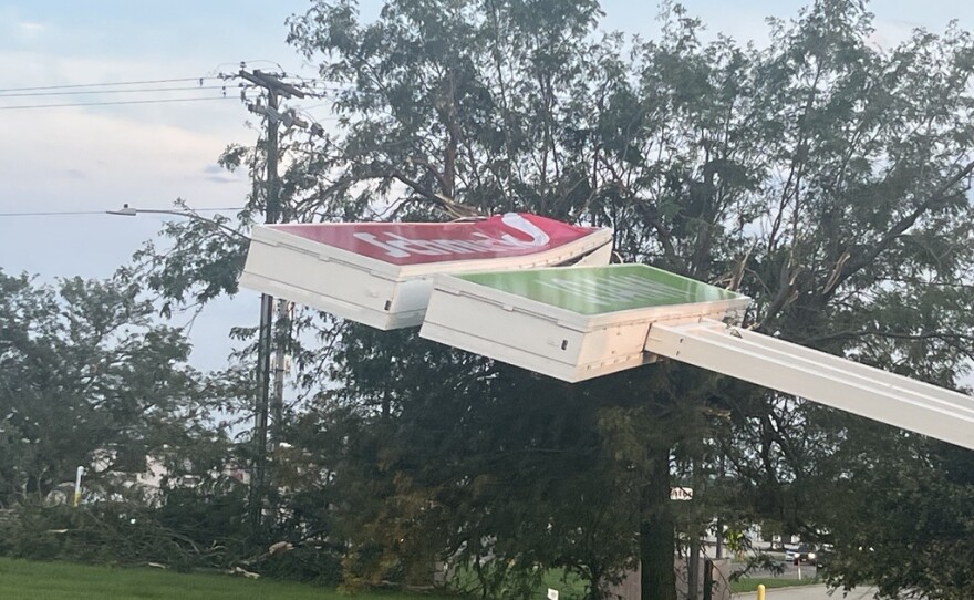 The storm took down this Schnucks and JoAnn Fabrics sign near Empire and Veterans Parkway in east Bloomington on Thursday, Aug. 13, 2026.