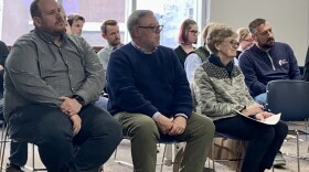 Connect Transit leaders look on as the Bloomington City Council votes 7-2 on Monday to approve a plan for a downtown transit center at 202 W. Market Street, the home of the aging city-owned Market Street parking deck.