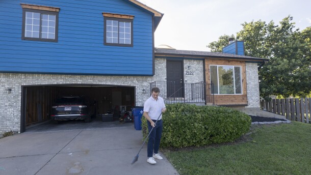 This house's bright blue facade might have discouraged other potential buyers. But it's become the east Wichita home of Alex and Natalie Beauchamp.