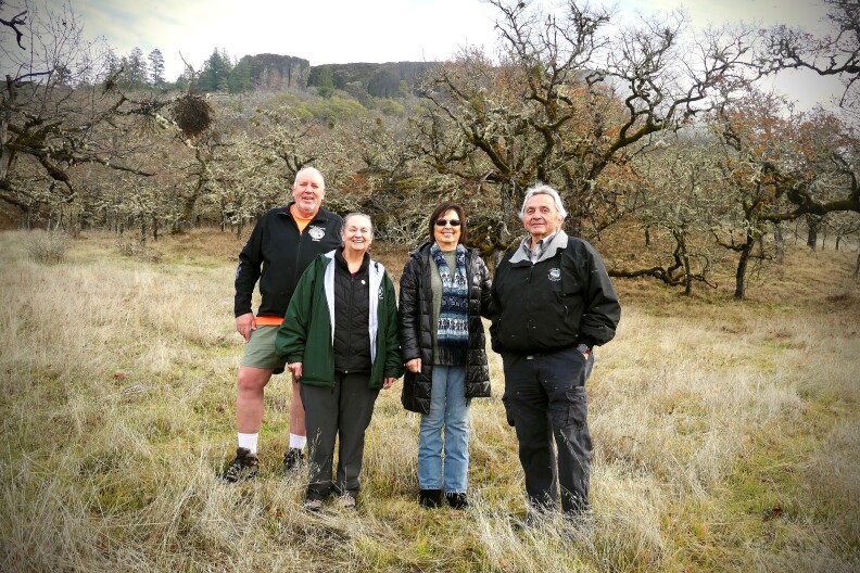 Siletz Tribal Council members (L to R) Robert Kentta (Treasurer), July Muschamp (Secretary), Delores Pigsley (Chairman) and Gerald Ben on newly purchased Table Rock land.