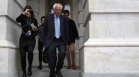 Former Democratic presidential candidate Sen. Bernie Sanders, I-Vt., departs Capitol Hill in Washington, Wednesday, March 18, 2020, after the Senate passed a second coronavirus response bill. Sanders announced on Wednesday he is suspending his campaign.