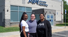 From left, Fiona Duncan, pharmacist-in-charge; Elisabeth Combs, manager of retail operations; and Egypt Pringley, district manager for the state of Virginia, stand outside AYR's newly opened dispensary just south of Winchester.