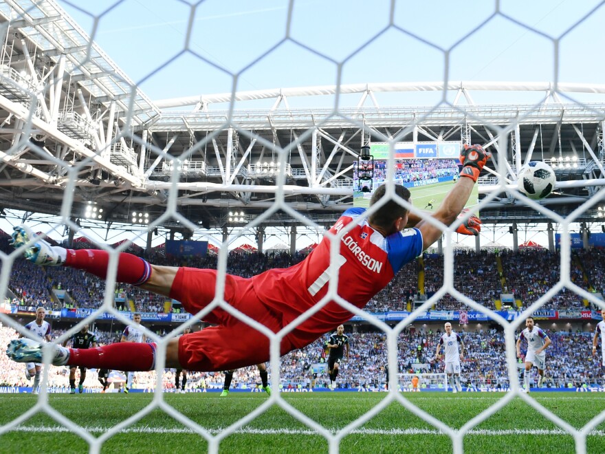 Hannes Halldorsson of Iceland saves a penalty kick by Lionel Messi of Argentina on Saturday in Moscow.