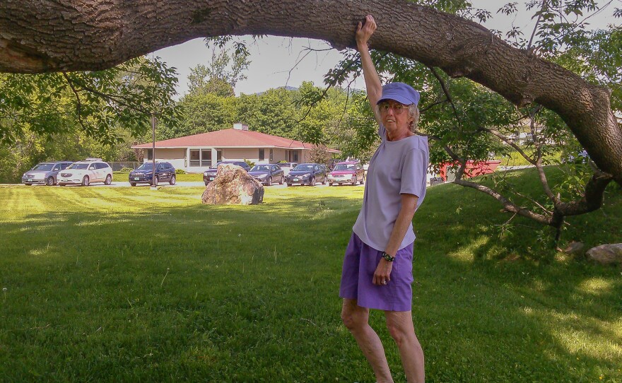 A family photo of Marilyn Kelly outside Our House Too.