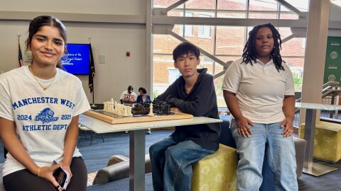 Daria Martin-Bennitt, right, planned to enroll in Job Corps' electrical program after graduating from Manchester West High School in June. She and two other Manchester students, Nistha Prasai, a junior at West, and Andy Pham, who graduated from Memorial High School in June, are calling on the Trump administration to reverse its decision to close the program.